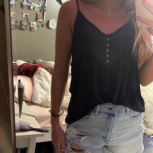 blueish tank with buttons